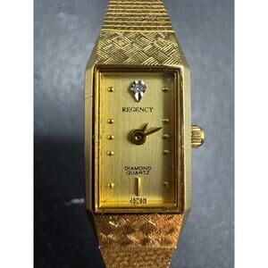 Vintage REGENCY Diamond Quartz Ladies 7110 Gold Tone Tank Watch 12.1mm
